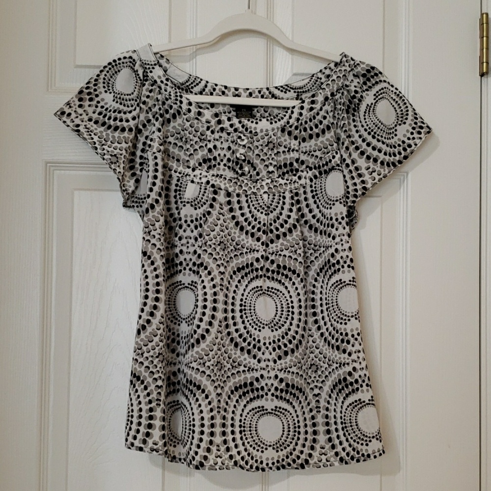 Sheer black and white print top.